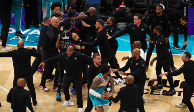 Moussa Diabate #14 and Miles Bridges #0 of the Charlotte Hornets fight Jalen Duren #0 of the Detroit Pistons during the second half of a basketball game at Spectrum Center on February 09, 2026 in Charlotte, North Carolina.