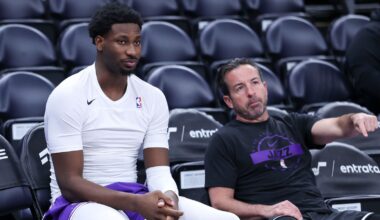 Utah Jazz forward Jaren Jackson Jr., left, speaks with assistant coach Scott Morrison before an NBA basketball game against the Sacramento Kings, Wednesday, Feb. 11, 2026, in Salt Lake City. (AP Photo/Rob Gray)