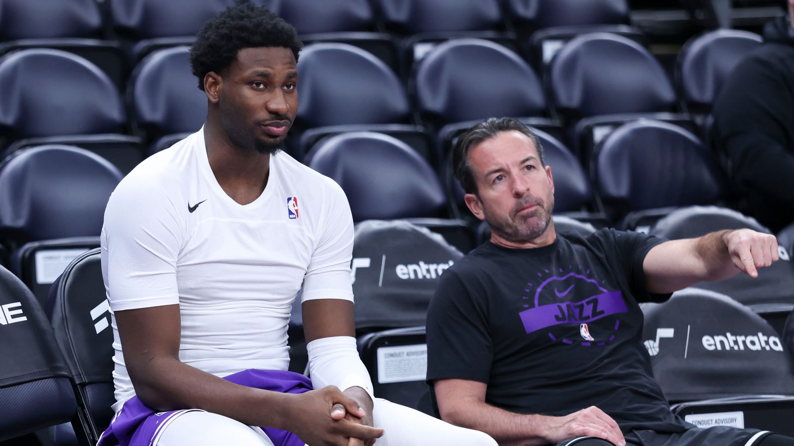 Utah Jazz forward Jaren Jackson Jr., left, speaks with assistant coach Scott Morrison before an NBA basketball game against the Sacramento Kings, Wednesday, Feb. 11, 2026, in Salt Lake City. (AP Photo/Rob Gray)