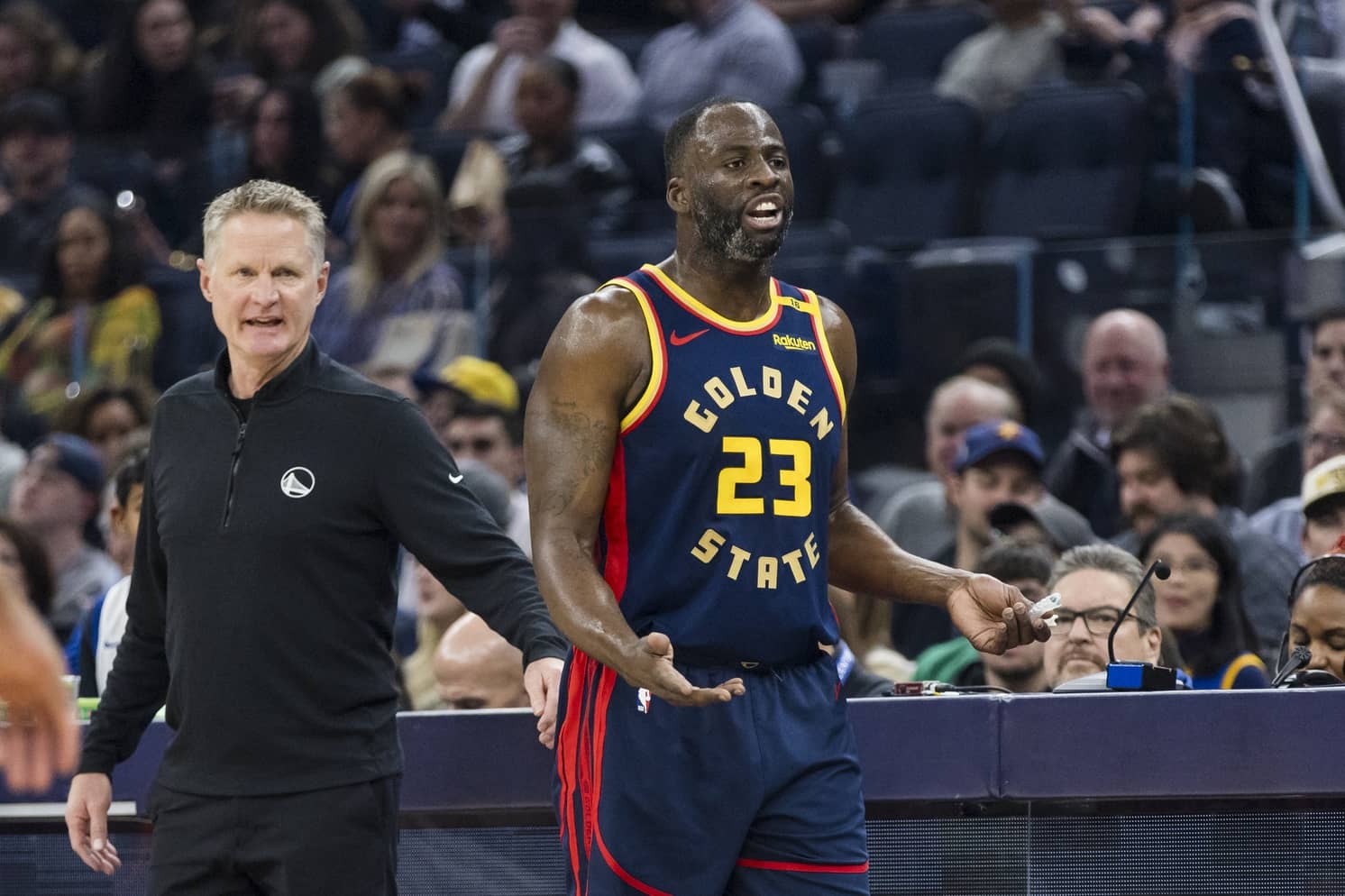 San Francisco, California, USA; Golden State Warriors forward Draymond Green (23) and head coach Steve Kerr react during the first quarter against the Miami Heat at Chase Center. Mandatory Credit: John Hefti-Imagn Images
