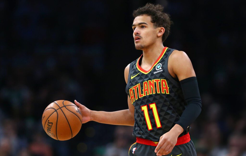 BOSTON, MA - DECEMBER 14: Trae Young #11 of the Atlanta Hawks dribbles against the Boston Celtics during the first quarter at TD Garden on December 14, 2018 in Boston, Massachusetts. (Photo by Maddie Meyer/Getty Images)