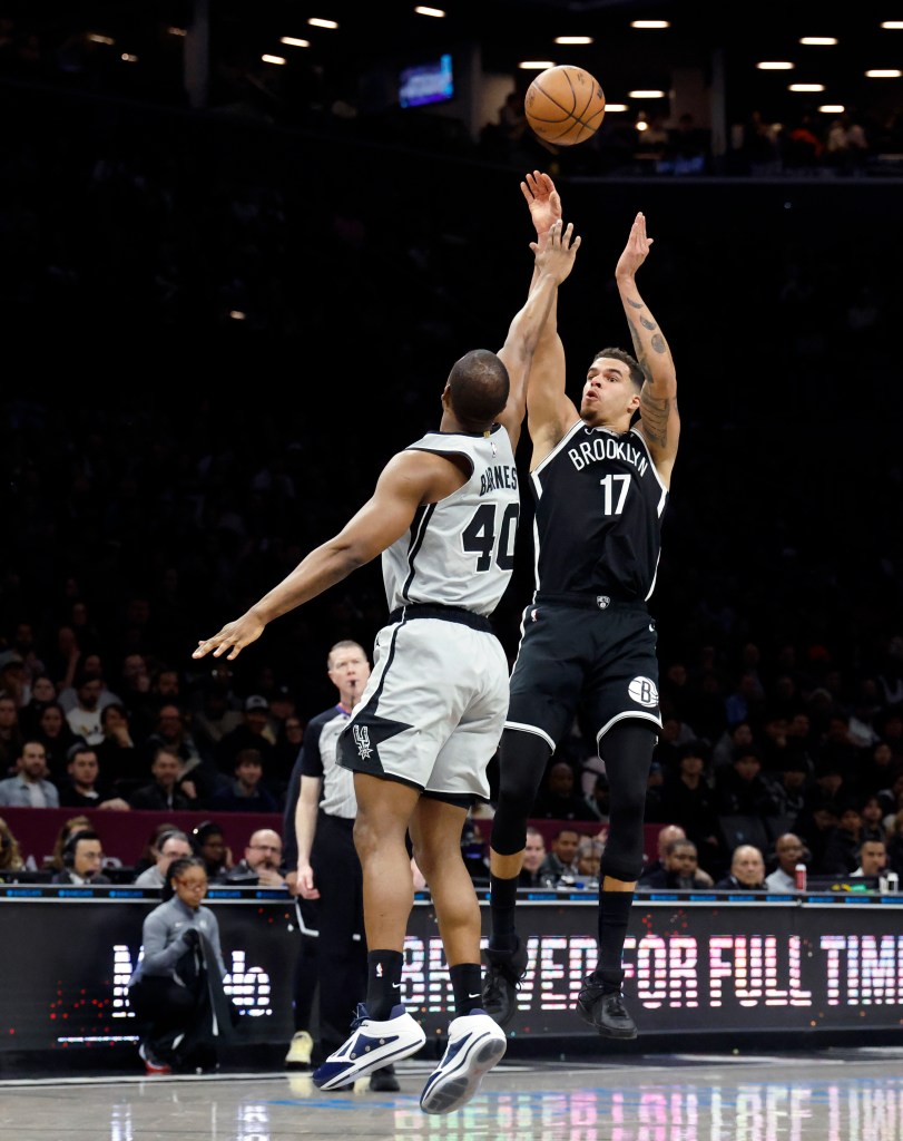 Brooklyn Nets Michael Porter Jr. shooting over San Antonio Spurs Harrison Barnes. 