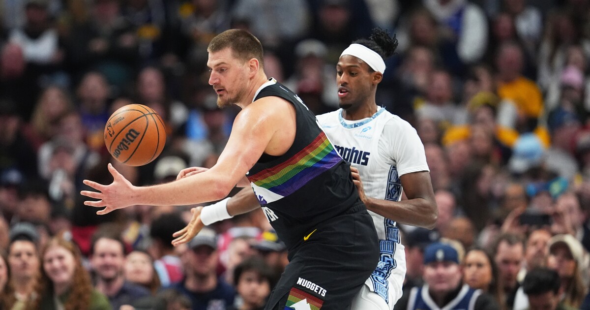 Jokic and Murray lead Nuggets past scrappy Grizzlies 122-116 Wednesday night