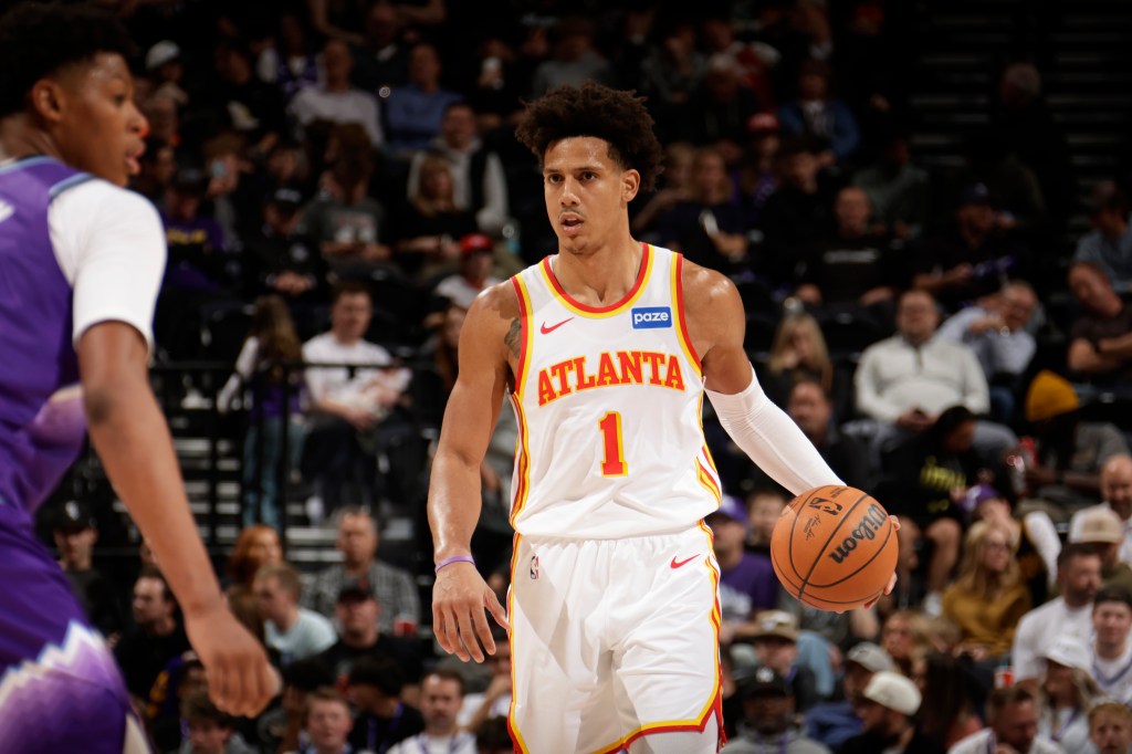 Jalen Johnson of the Atlanta Hawks dribbles the ball.