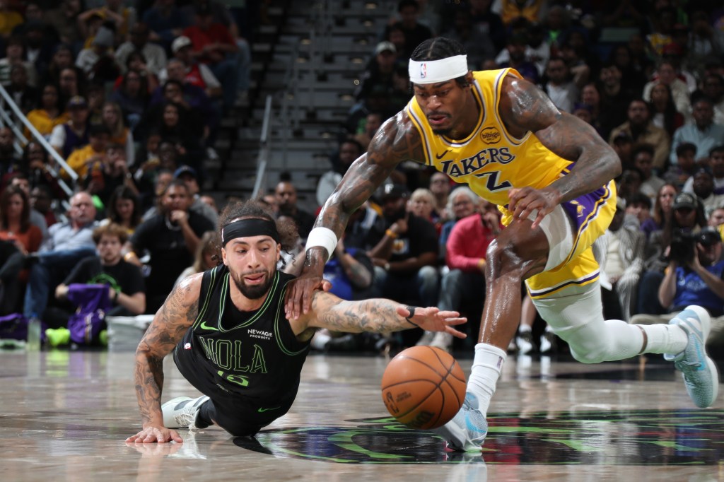Jose Alvarado #15 of the New Orleans Pelicans dives after loose ball during the game against the Los Angeles Lakers on January 6, 2026