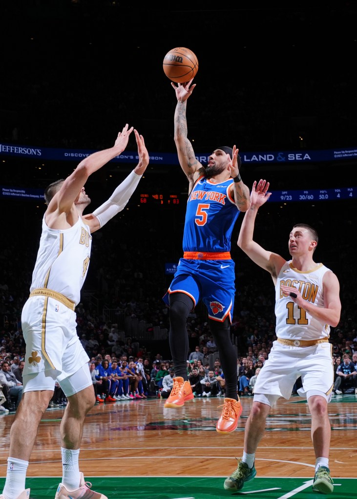 Jose Alvarado #5 of the New York Knicks drives to the basket against the Celtics on Feb. 8, 2026.