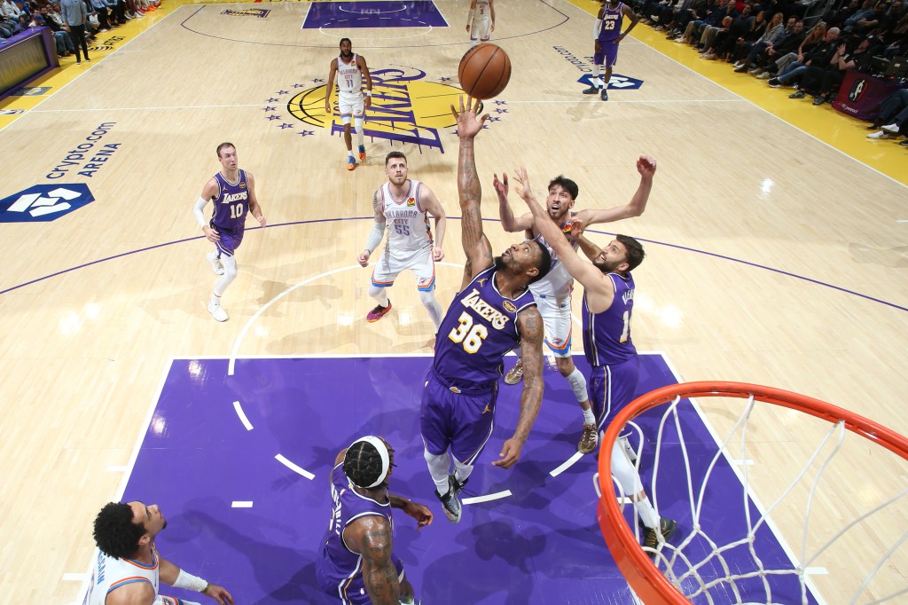 Marcus Smart #36 of the Los Angeles Lakers going up for a rebound against the Oklahoma City Thunder.