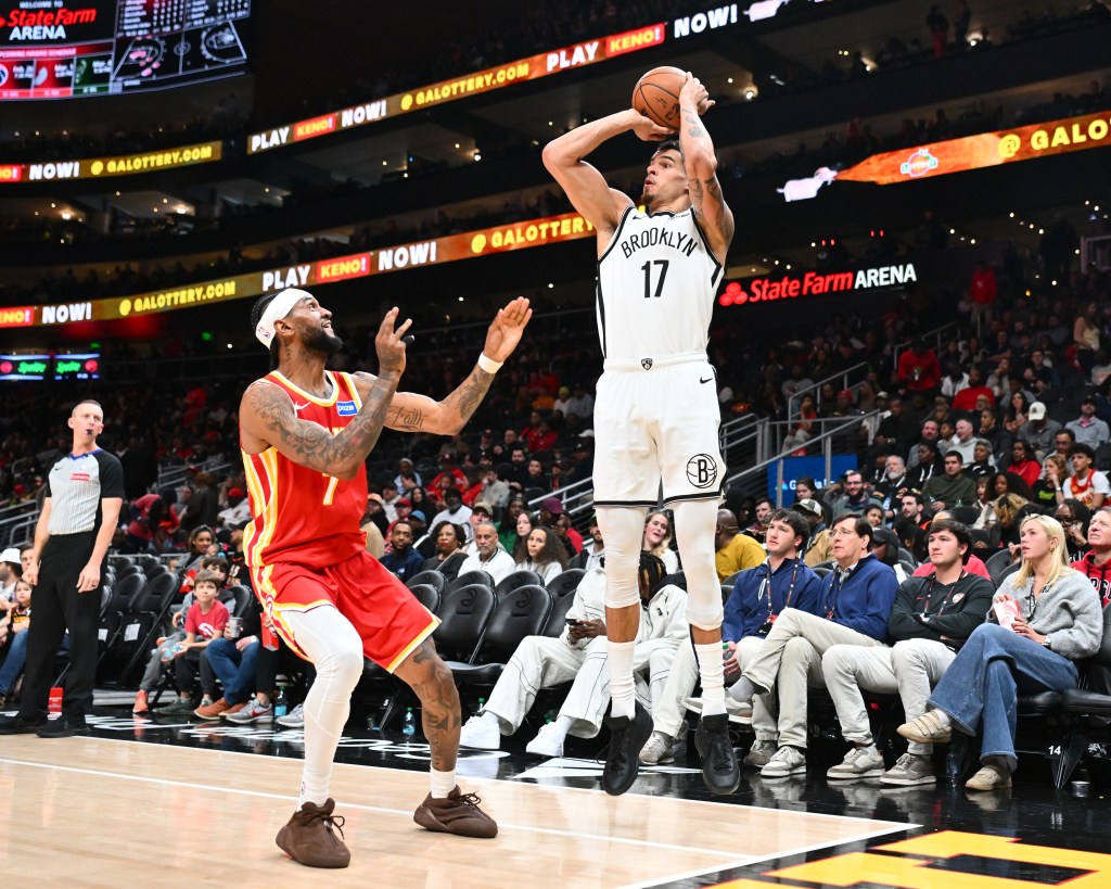 Egor Demin of the Brooklyn Nets drives to the basket against the Atlanta Hawks.