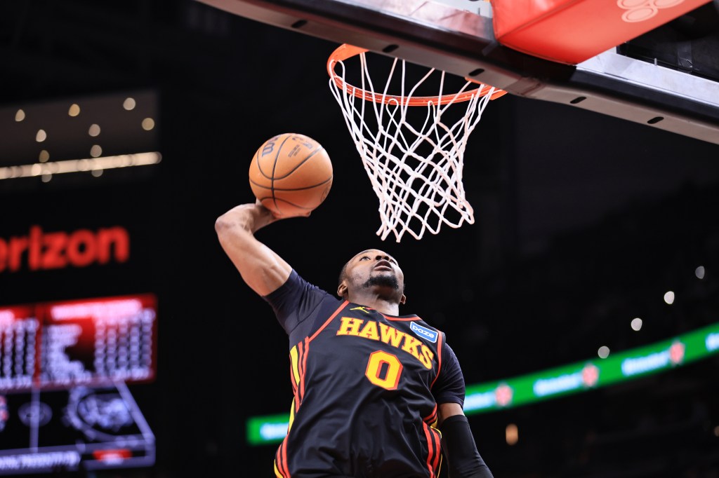 Jonathan Kuminga #0 of the Atlanta Hawks dunks the ball during the game against the Washington Wizards on February 24, 2026 at State Farm Arena in Atlanta, Georgia.