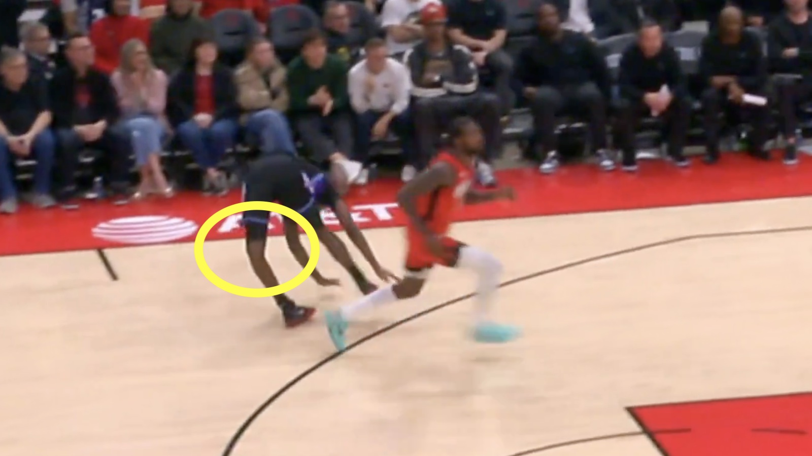 Jazz guard Vince Williams Jr. suffering a knee injury after taking a shot from Rockets wing Tari Eason