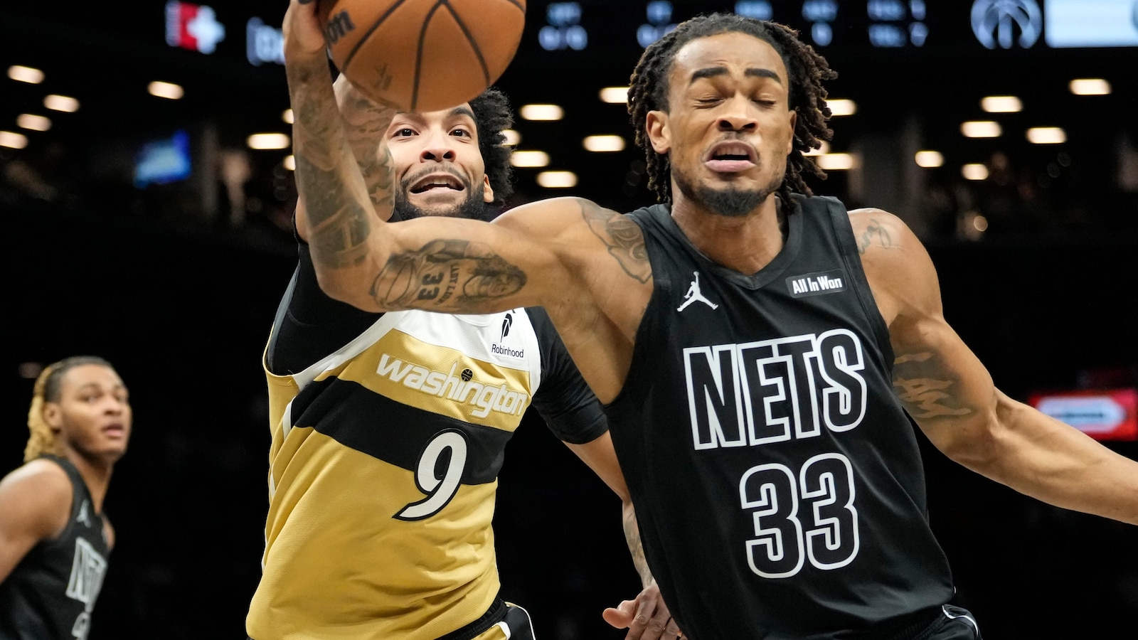 Nets score 80 points in the first half and beat the short-handed Wizards 127-113