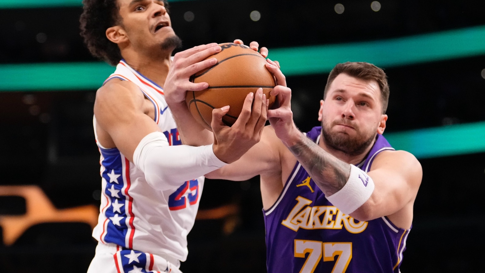 Luka Doncic to have an MRI after leaving Lakers' game against 76ers with left hamstring injury