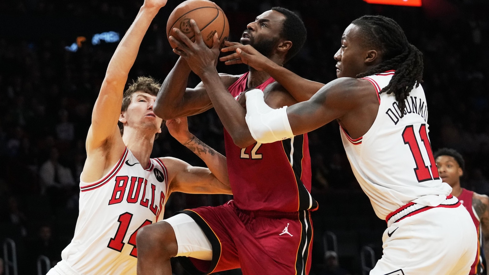 Ayo Dosunmu's season-high 29 points lead short-handed Bulls past Heat, 125-118