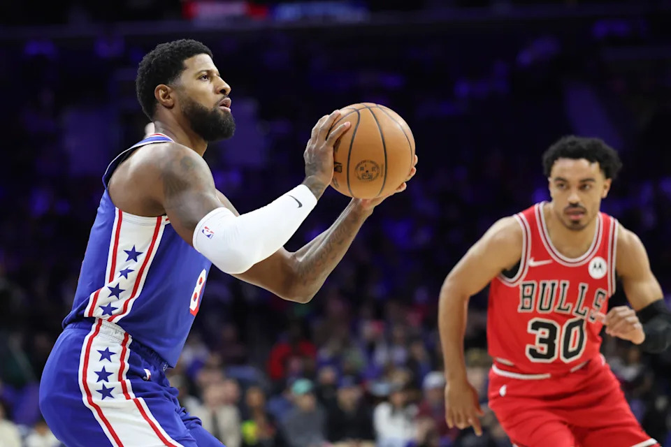 Mar 25, 2026; Philadelphia, Pennsylvania, USA; Philadelphia 76ers forward Paul George (8) shoots in front of Chicago Bulls guard Tre Jones (30) during the first quarter at Xfinity Mobile Arena. Mandatory Credit: Bill Streicher-Imagn Images