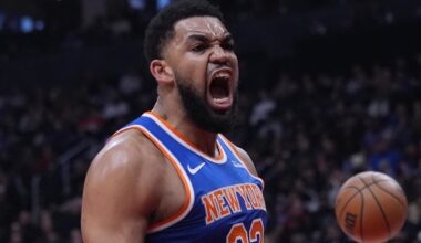 Mar 3, 2026; Toronto, Ontario, CAN; New York Knicks center Karl-Anthony Towns (32) reacts after making a basket against the Toronto Raptors during the first half at Scotiabank Arena. Mandatory Credit: John E. Sokolowski-Imagn Images