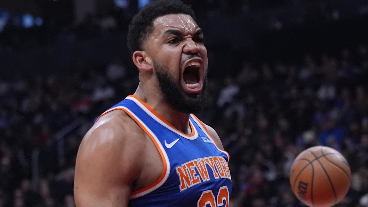 Mar 3, 2026; Toronto, Ontario, CAN; New York Knicks center Karl-Anthony Towns (32) reacts after making a basket against the Toronto Raptors during the first half at Scotiabank Arena. Mandatory Credit: John E. Sokolowski-Imagn Images