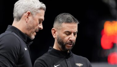 Feb 2, 2026; Charlotte, North Carolina, USA; New Orleans Pelicans head coach James Borrego chats with assistant Casey Hill  during the second quarter against the Charlotte Hornets at the Spectrum Center. Mandatory Credit: Jim Dedmon-Imagn Images