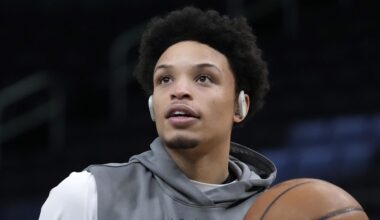 Milwaukee Bucks guard Ryan Rollins (13) takes a shot during pregame warmups before a game against the Philadelphia 76ers at Fiserv Forum on January 19, 2025.