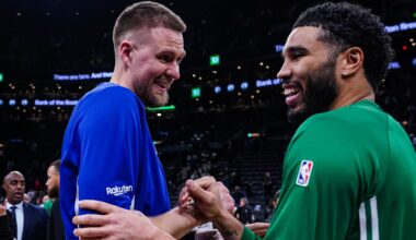 Mar 18, 2026; Boston, Massachusetts, USA; Golden State Warriors center Kristaps Porzingis (7) talks with Boston Celtics forward Jayson Tatum (0) after the game at TD Garden. Mandatory Credit: David Butler II-Imagn Images