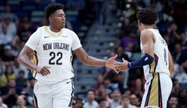 Dec 26, 2025; New Orleans, Louisiana, USA;  New Orleans Pelicans center Derik Queen (22) celebrates a basket with guard Jeremiah Fears (0) during the first half against the Phoenix Suns at Smoothie King Center. Mandatory Credit: Matthew Hinton-Imagn Images