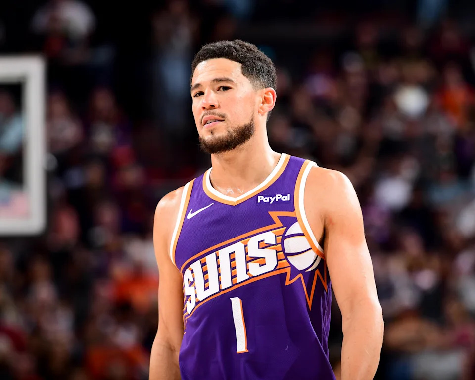 PHOENIX, AZ – MARCH 22: Devin Booker #1 of the Phoenix Suns smiles during the game against the Toronto Raptors on March 22, 2026 at PHX Arena in Phoenix, Arizona. NOTE TO USER: User expressly acknowledges and agrees that, by downloading and or using this photograph, user is consenting to the terms and conditions of the Getty Images License Agreement. Mandatory Copyright Notice: Copyright 2026 NBAE (Photo by Kate Frese/NBAE via Getty Images) | NBAE via Getty Images