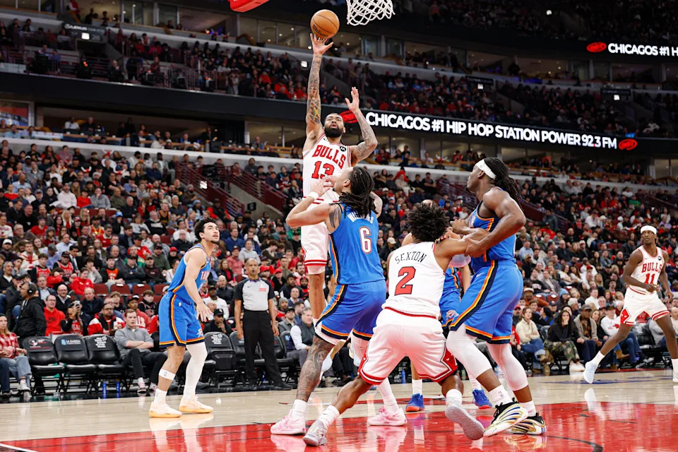 Mar 3, 2026; Chicago, Illinois, USA; Chicago Bulls center Nick Richards (13) shoots against Oklahoma City Thunder forward Jaylin Williams (6) during the first half at United Center. Mandatory Credit: Kamil Krzaczynski-Imagn Images