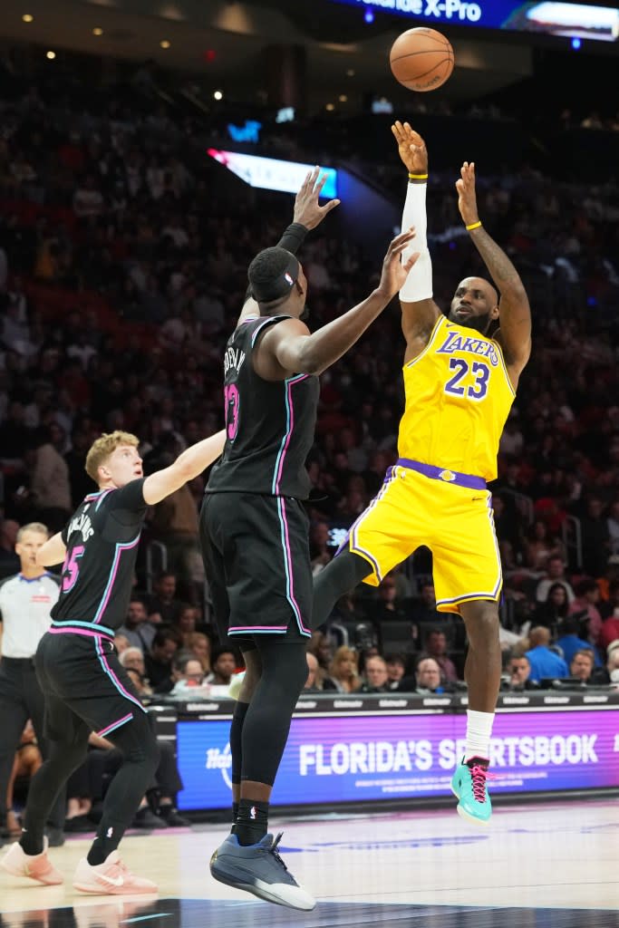 The Lakers’ LeBron James had a triple-double Thursday night against the host Heat. AP