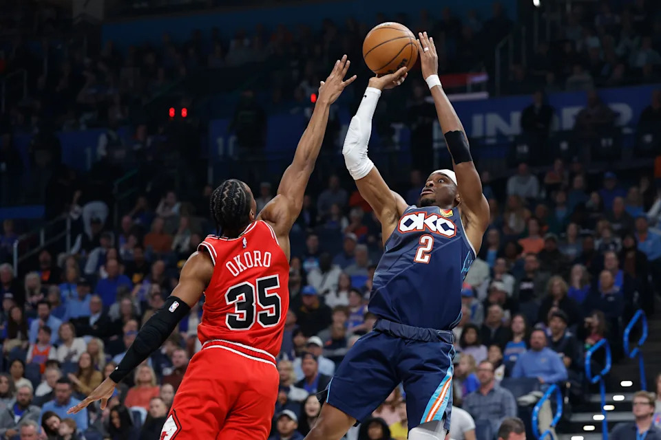 Mar 27, 2026; Oklahoma City, Oklahoma, USA; Oklahoma City Thunder guard Shai Gilgeous-Alexander (2) shoots as Chicago Bulls forward Isaac Okoro (35) defends during the first quarter at Paycom Center. Mandatory Credit: Alonzo Adams-Imagn Images