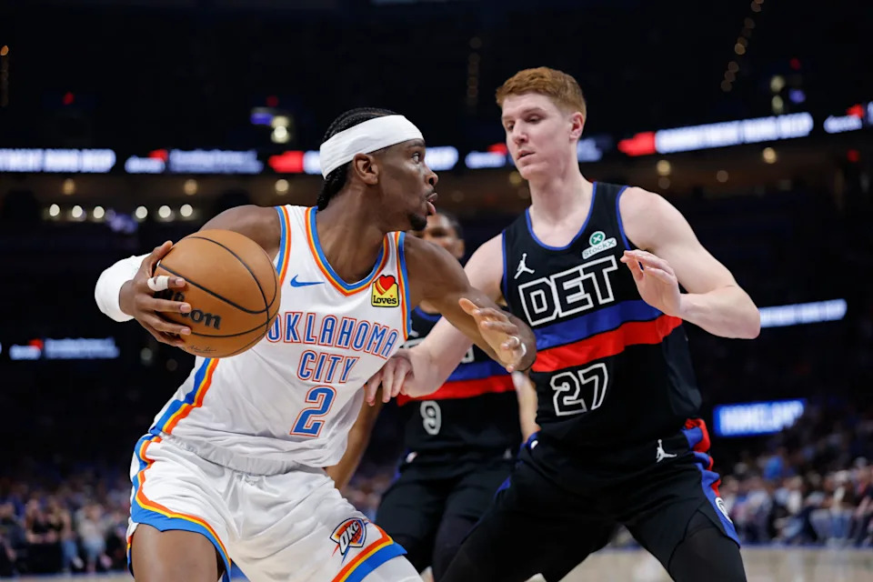Mar 30, 2026; Oklahoma City, Oklahoma, USA; Oklahoma City Thunder guard Shai Gilgeous-Alexander (2) drives as Detroit Pistons guard Kevin Huerter (27) defends during overtime at Paycom Center. Mandatory Credit: Alonzo Adams-Imagn Images