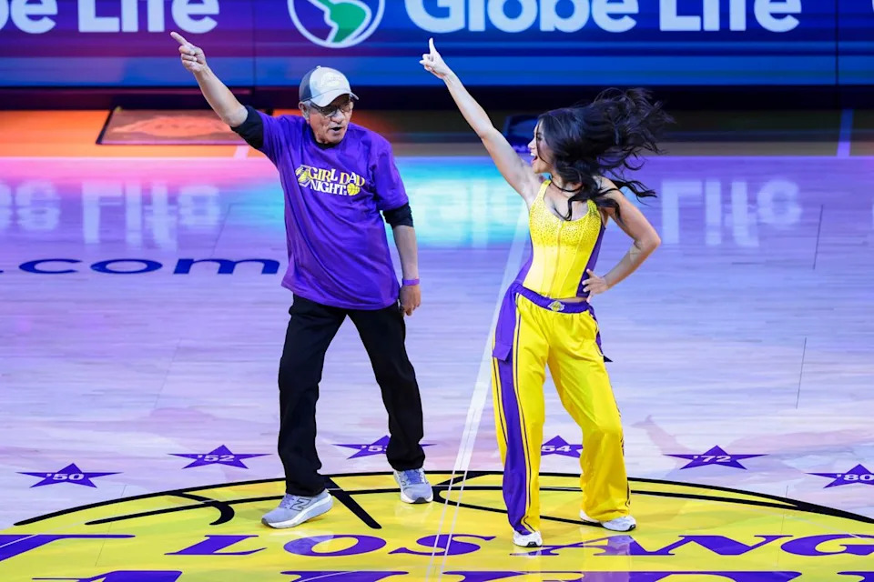 The Lakers Girls perform with their dads and special guests as part of Girl Dad Night during an NBA game between the Los Angeles Lakers and Chicago Bulls, Thursday March 12, 2026 in Los Angeles, Calif.