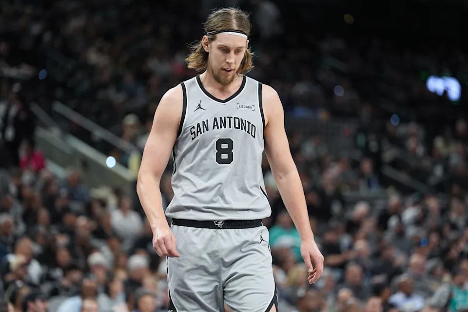 Jan 3, 2026; San Antonio, Texas, USA; San Antonio Spurs forward/center Kelly Olynyk (8) walks up the court in the first half against the Portland Trail Blazers at Frost Bank Center. Mandatory Credit: Daniel Dunn-Imagn Images