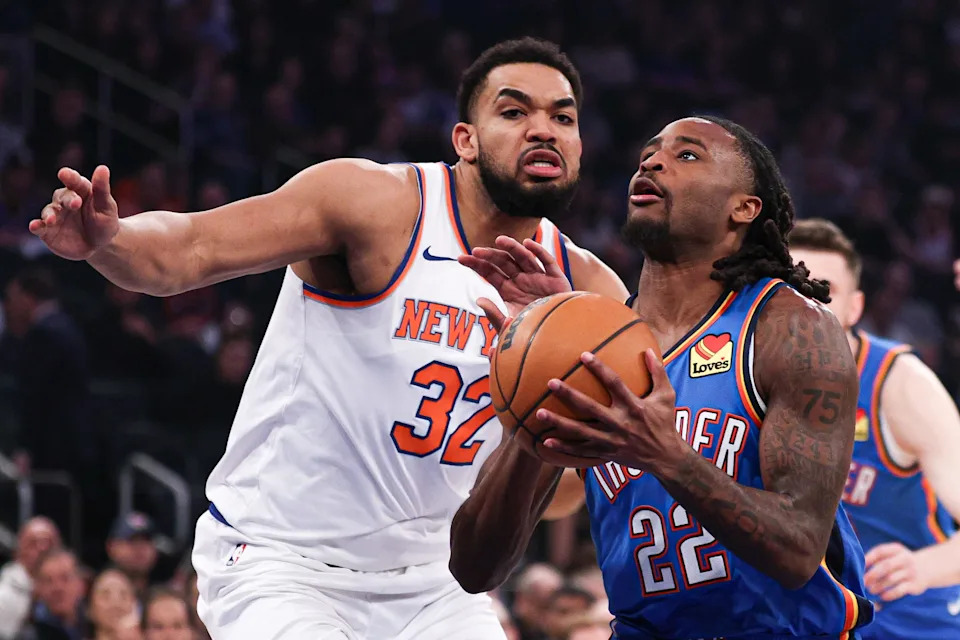 Mar 4, 2026; New York, New York, USA; Oklahoma City Thunder guard Cason Wallace (22) goes to the basket against New York Knicks center Karl-Anthony Towns (32) during the first half at Madison Square Garden. Mandatory Credit: Vincent Carchietta-Imagn Images