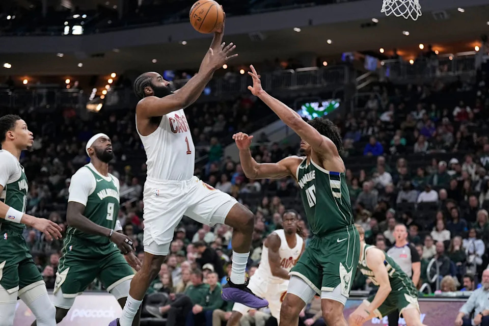 Mar 17, 2026; Milwaukee, Wisconsin, USA;Cleveland Cavaliers guard James Harden (1) drives to the basket against Milwaukee Bucks center Jericho Sims (00) in the first half at Fiserv Forum.