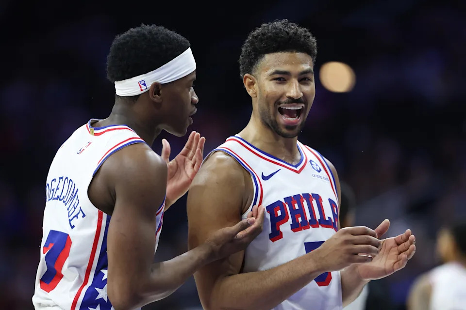 Mar 14, 2026; Philadelphia, Pennsylvania, USA; Philadelphia 76ers guard Quentin Grimes (5) reacts with guard Vj Edgecombe (77) during the fourth quarter against the Brooklyn Nets at Xfinity Mobile Arena. Mandatory Credit: Bill Streicher-Imagn Images