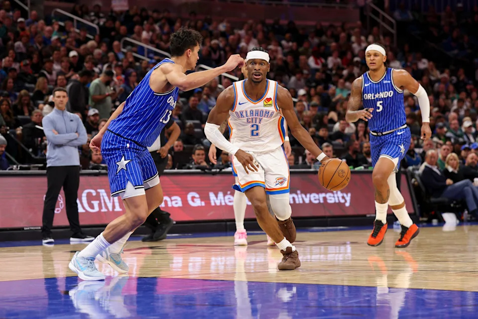 aMar 17, 2026; Orlando, Florida, USA; Oklahoma City Thunder guard Shai Gilgeous-Alexander (2) drives to the basket past Orlando Magic forward Tristan da Silva (23) in the third quarter at Kia Center. Mandatory Credit: Nathan Ray Seebeck-Imagn Images