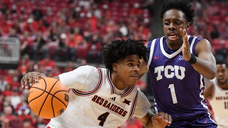 Texas Tech guard Christian Anderson (4) dribbles the ball while...