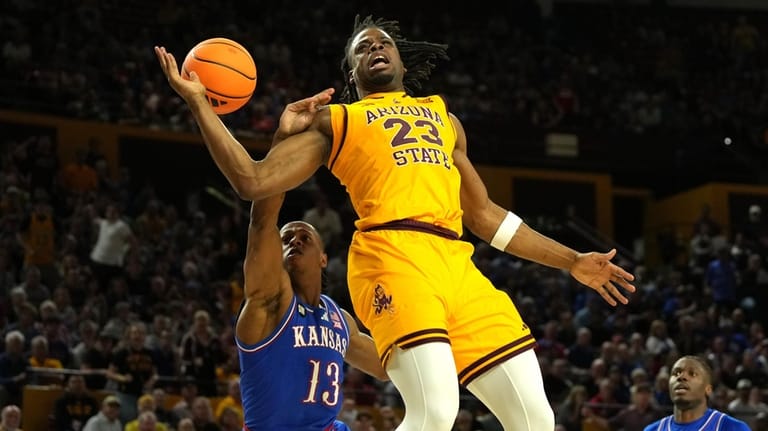 Kansas guard Elmarko Jackson (13) fouls Arizona State forward Allen...