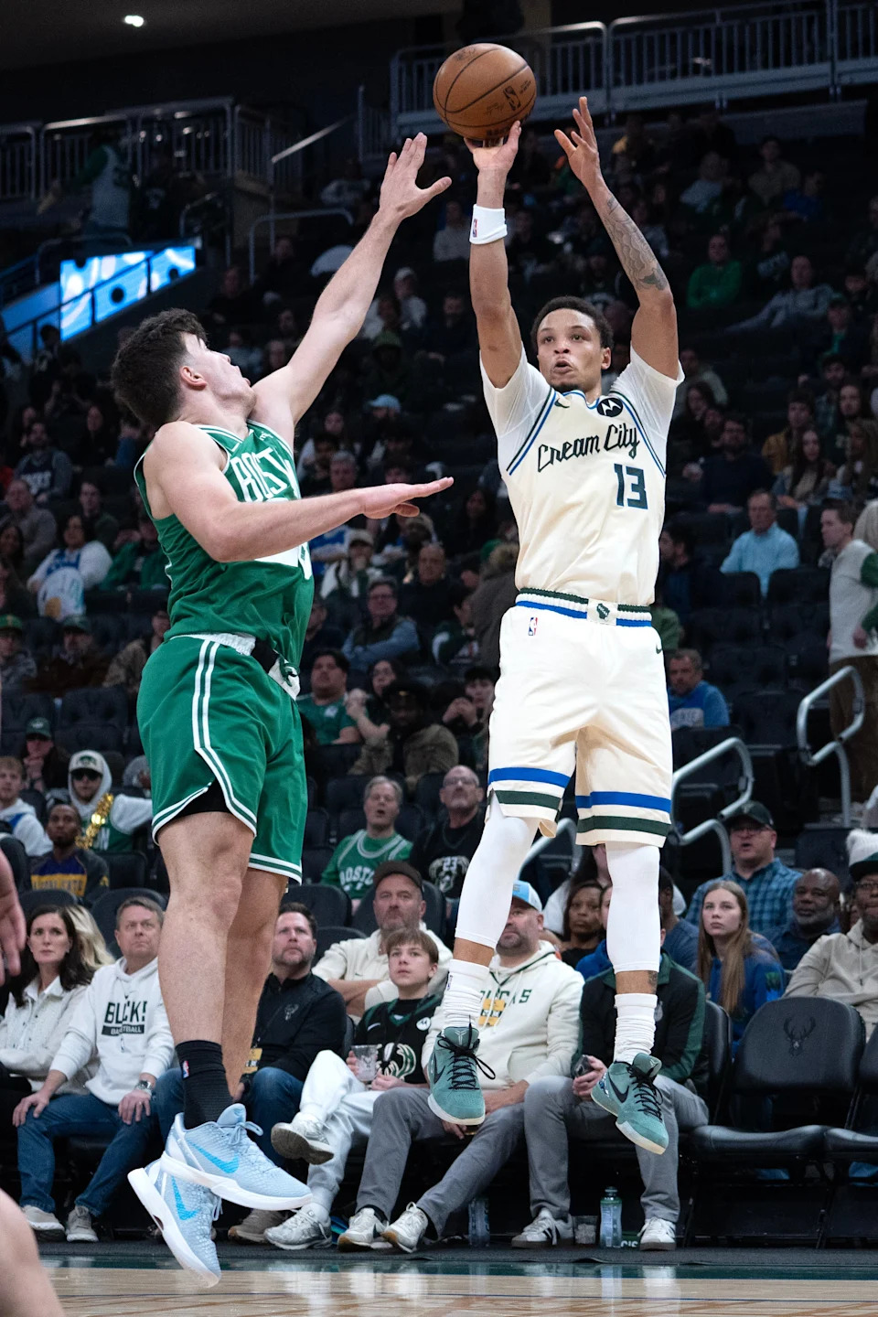 Milwaukee Bucks guard Ryan Rollins (13) takes a jump shot in the second half at Fiserv Forum on the evening of March 2, 2026 in Milwaukee, Wisconsin.