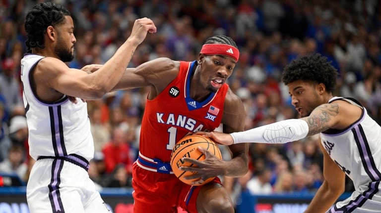 Kansas State guard PJ Haggerty, right, tries to strip the...
