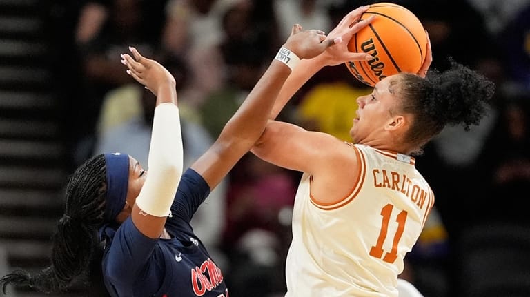 Texas forward Justice Carlton shoots over Mississippi guard Debreasha Powe...
