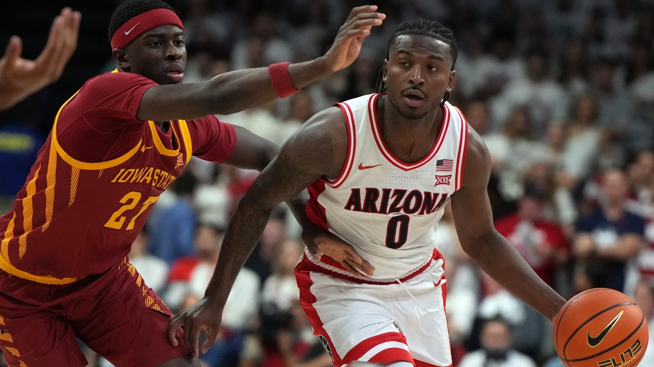 Arizona guard Jaden Bradley and coach Tommy Lloyd pick up Big 12 awards