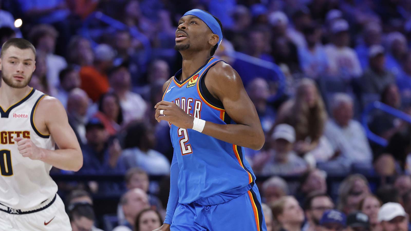 Thunder guard Shai Gilgeous-Alexander (2) gestures after scoring against the Denver Nuggets during the second quarter at Paycom Center