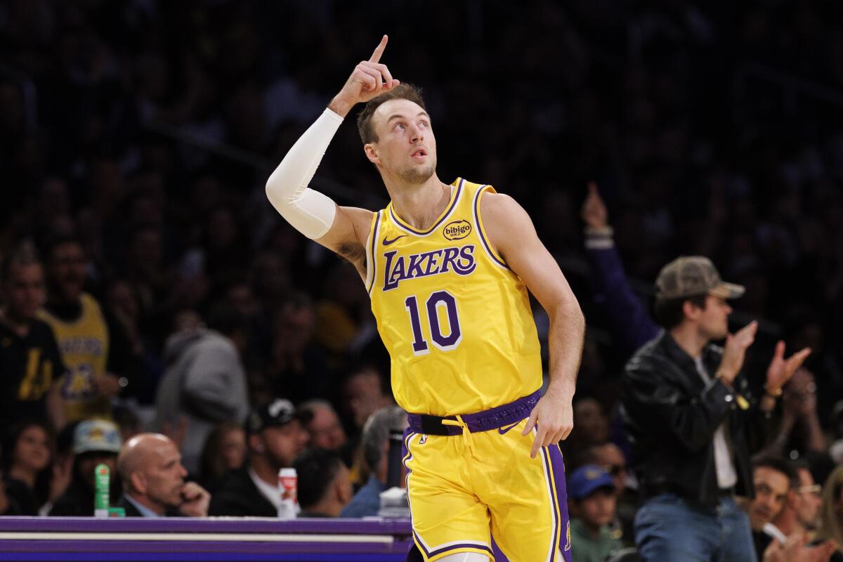 Lakers guard Luke Kennard reacts after making a three-pointer against the Golden State Warriors.