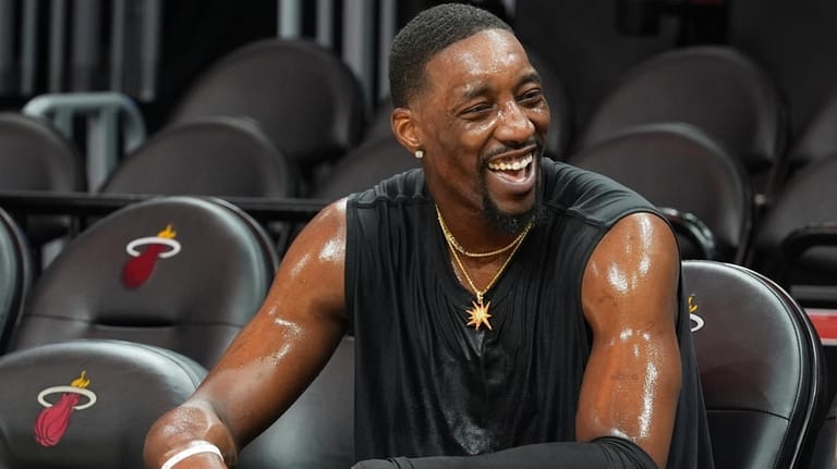 Miami Heat center Bam Adebayo warms up before a game...