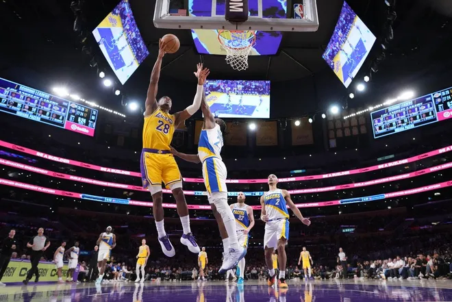 Mar 6, 2026; Los Angeles, California, USA; Los Angeles Lakers forward Rui Hachimura (28) shoots the ball against the Los Angeles Lakers forward LeBron James (23) in the second half at Crypto.com Arena.