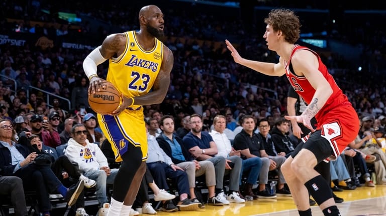 Los Angeles Lakers forward LeBron James (23) is defended during...
