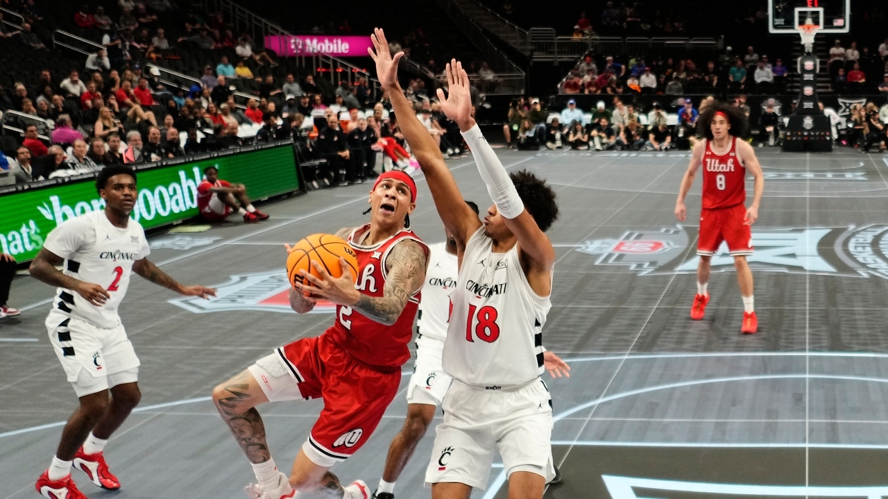 Big 12 ditching slippery glass floor for hardwood for rest of tournament