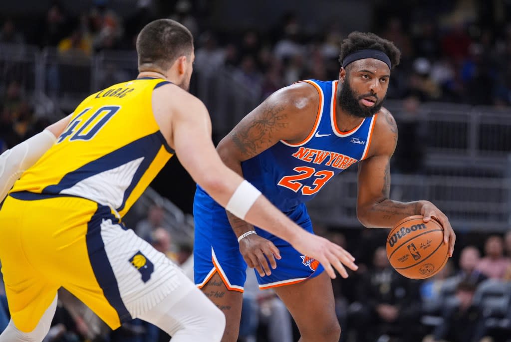 Mitchell Robinson, who grabbed 22 rebounds, drives on Ivica Zubac during the Knicks’ 101-92 win over the Pacers on March 13, 2026 in Indianapolis. AP