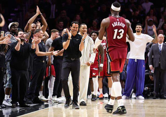Head coach Erik Spoelstra of the Miami Heat celebrates as Bam Adebayo #13 leaves the game during the fourth quarter against the Washington Wizards at Kaseya Center on March 10, 2026 in Miami.