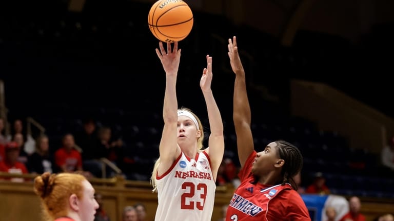 Nebraska guard Britt Prince (23) shoots againsty Richmond guard Alicia...